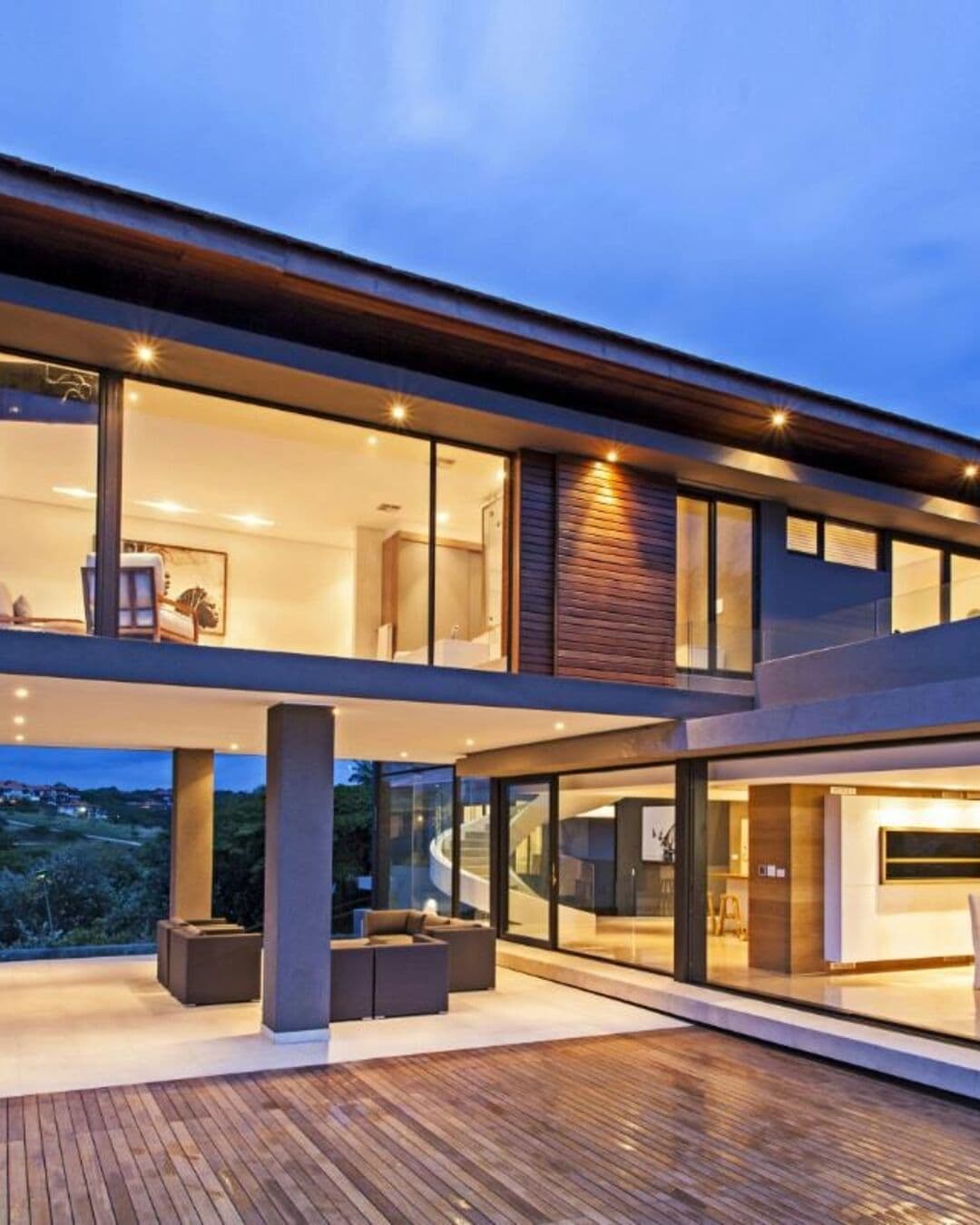 Pam Golding Properties campaign creative — contemporary South African home at dusk